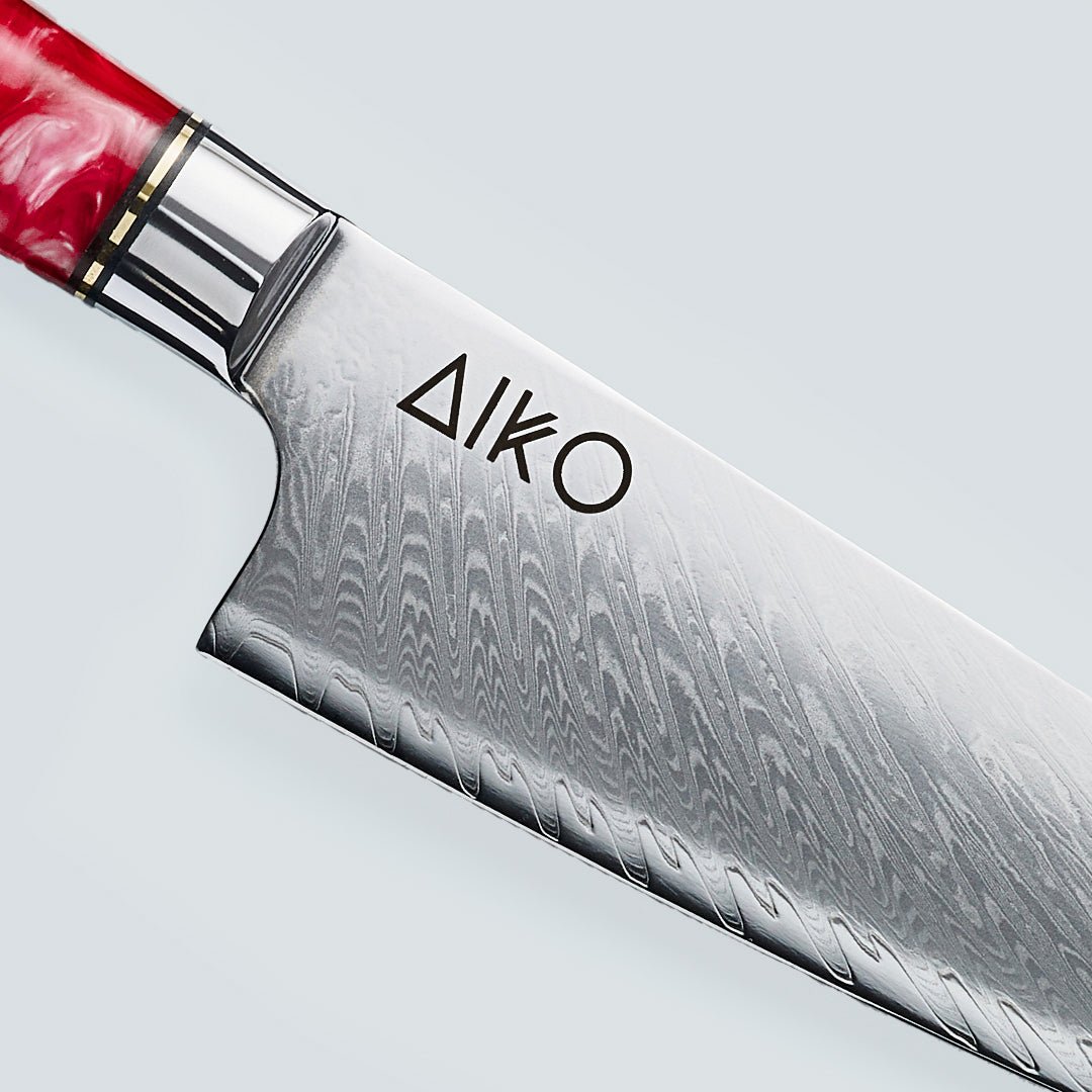 Aiko rosso (あいこ, アイコ) coltello in acciaio damasco con manico in resina rossa colorata