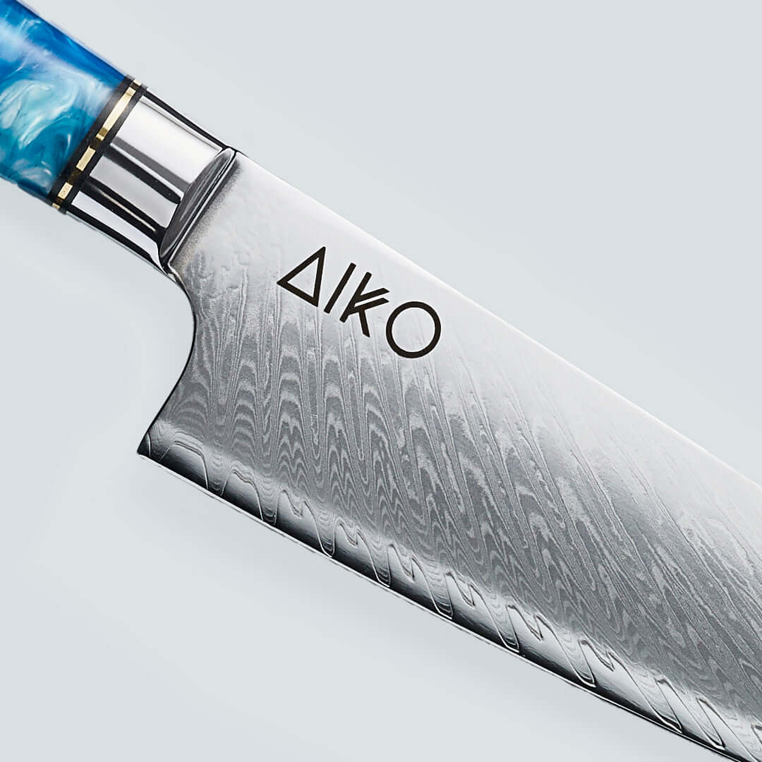 Aiko Blue (あいこ, アイコ) Damasco Knife in acciaio con maniglia di resina blu colorata