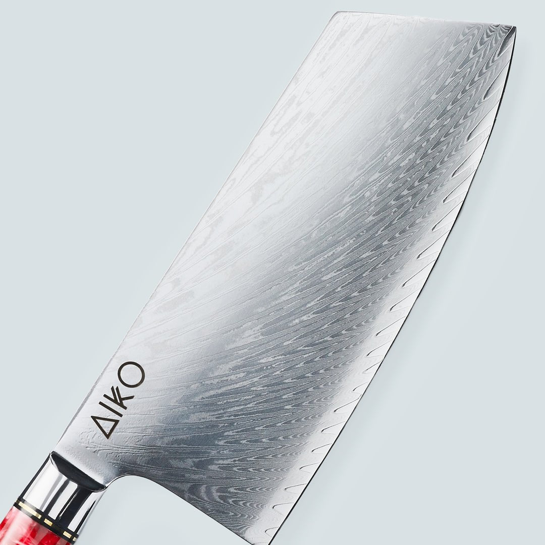 Aiko rosso (あいこ, アイコ) coltello in acciaio damasco con manico in resina rossa colorata