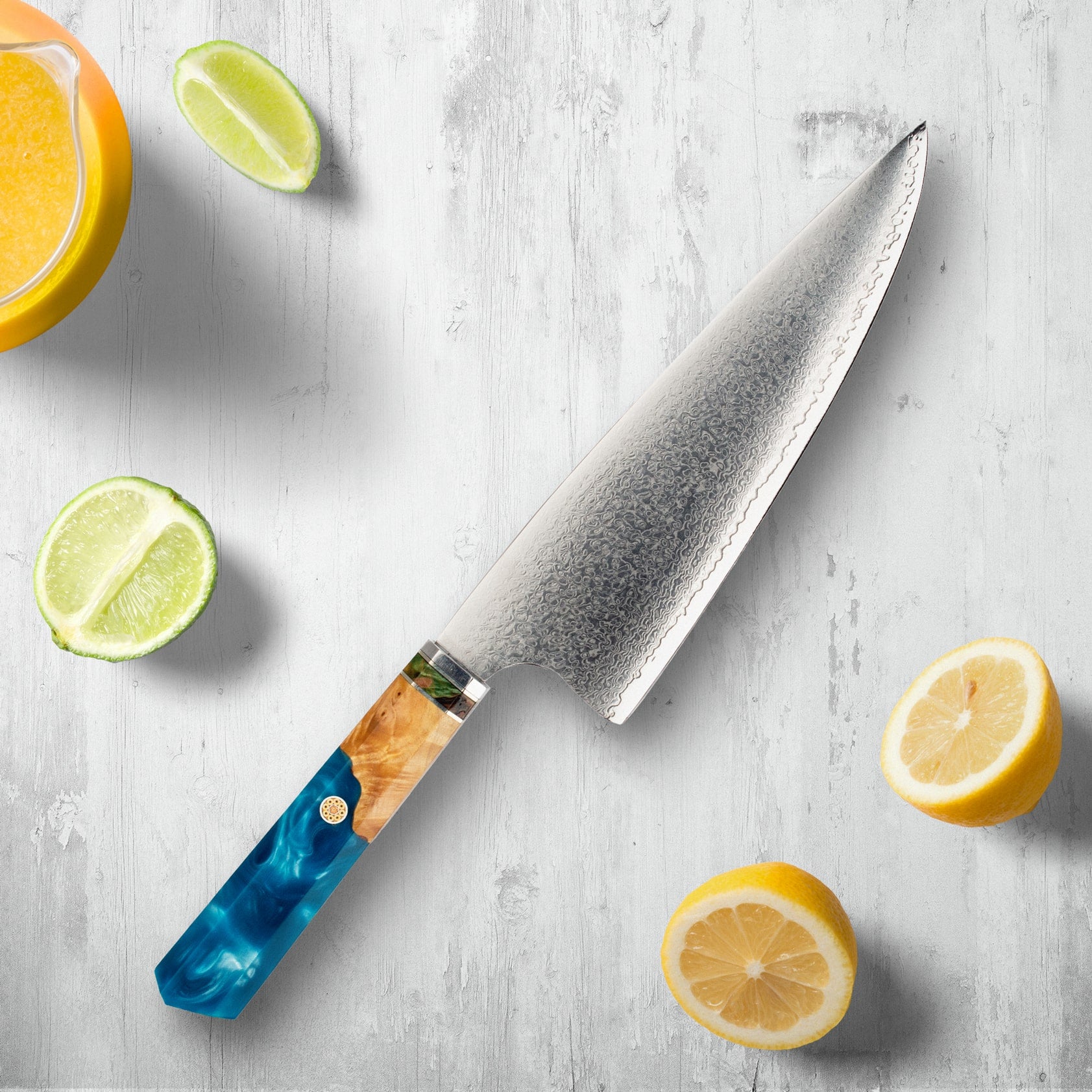 Coltelli in acciaio Makito Damasco con maniglia di resina blu colorata