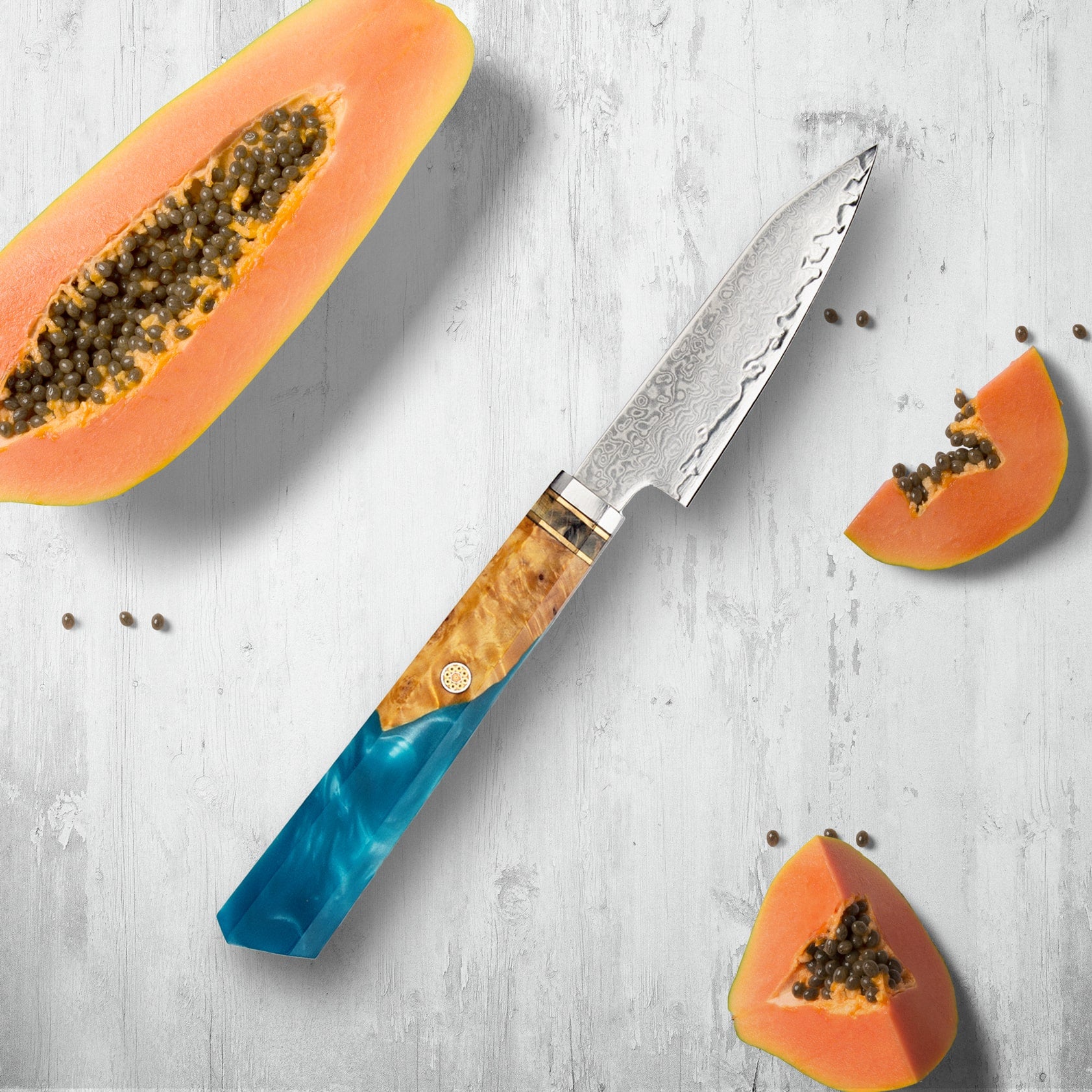 Coltelli in acciaio Makito Damasco con maniglia di resina blu colorata