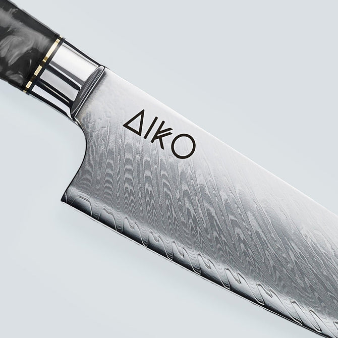 Coltello Aiko in Acciaio Damasco Nero con Manico in Resina Nera Colorata