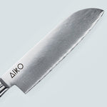 Coltello Aiko in acciaio damasco rosso con manico in resina colorata rossa